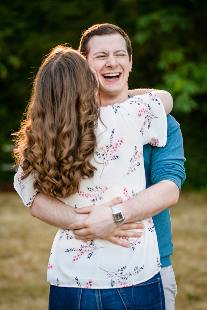 engagement session man laughing