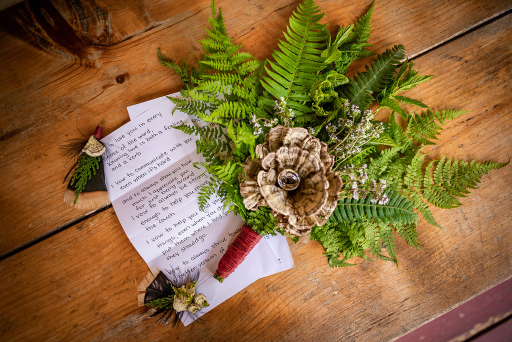 Handmade bouquet, rings and vows at Wallace Falls Lodge wedding
