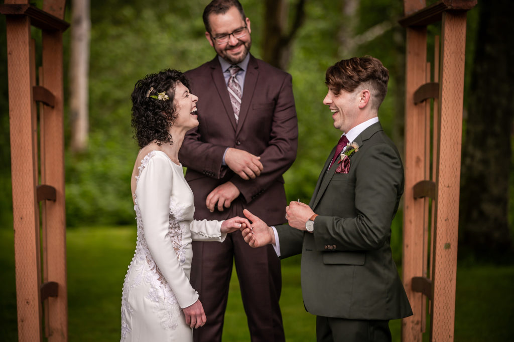 Funny ring exchange at Wallace Falls Lodge wedding