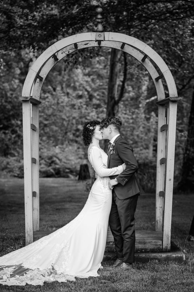 First kiss at Wallace Falls Lodge wedding