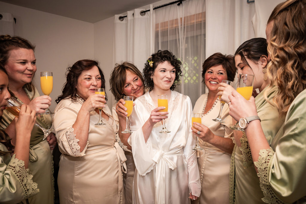 Bride and bridesmaids toast 