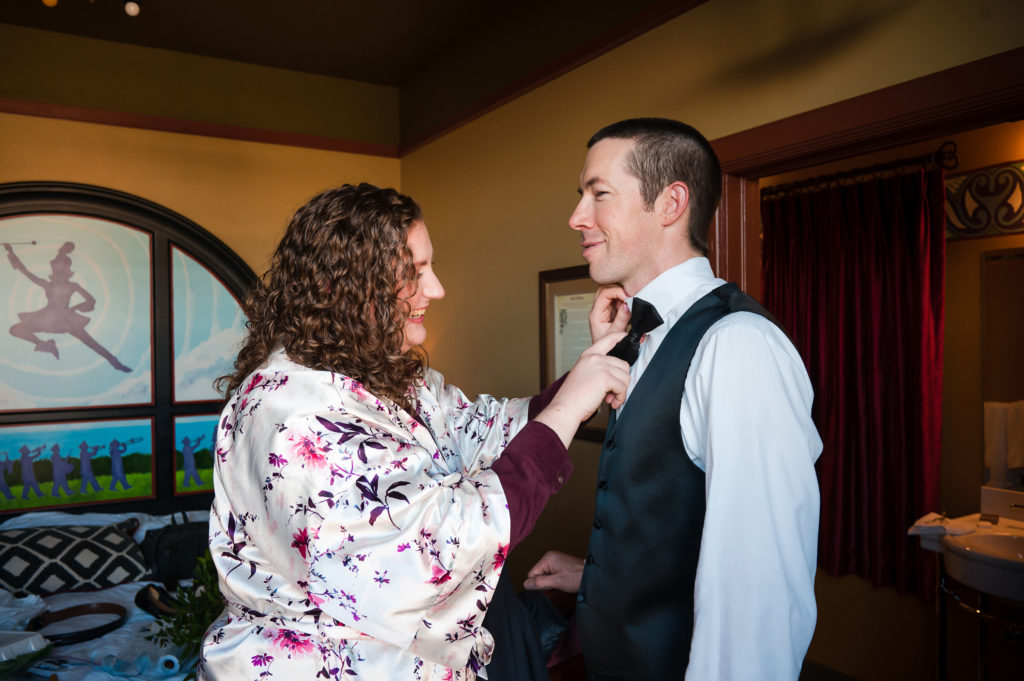 Bride and groom getting ready at McMenamins Elks Temple