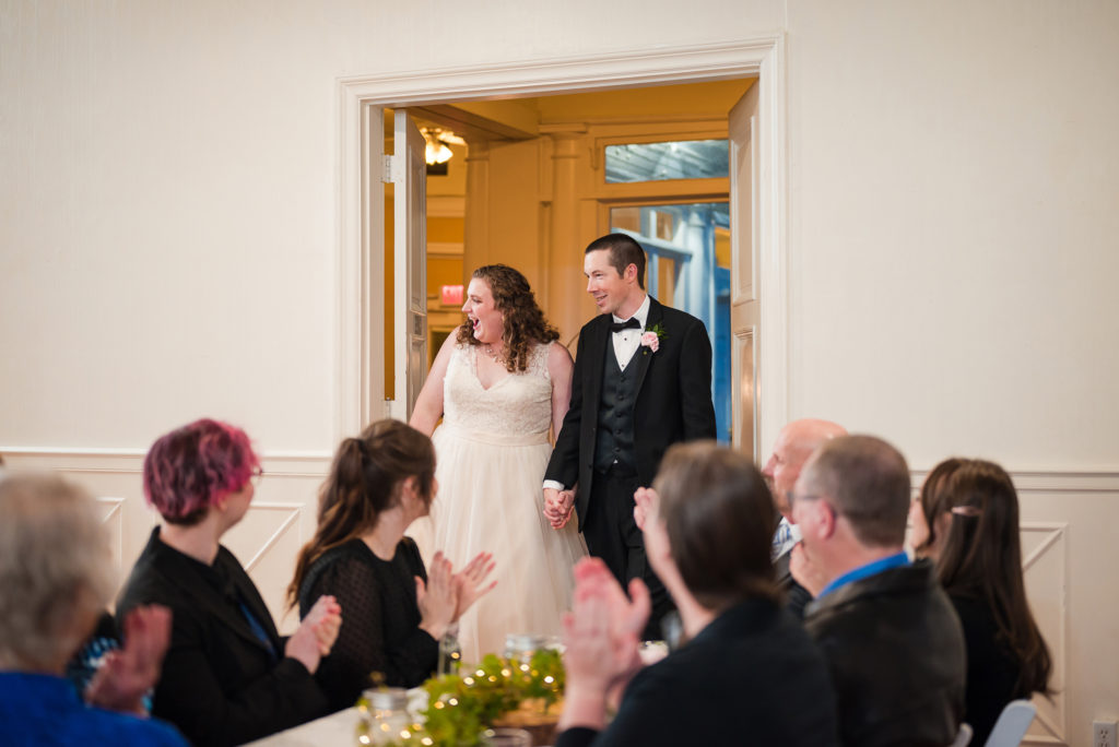 Bride and groom enter reception at Union Club Tacoma wedding